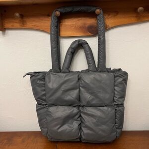 Dark gray zipper closure double handle puffer shoulder bag